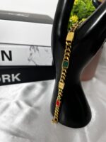 Stainless steel cuban link chain with center emblem platenon-tarnish bracelet - Image 2