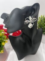 Silver Sculpted Floral Statement Earrings - Image 2