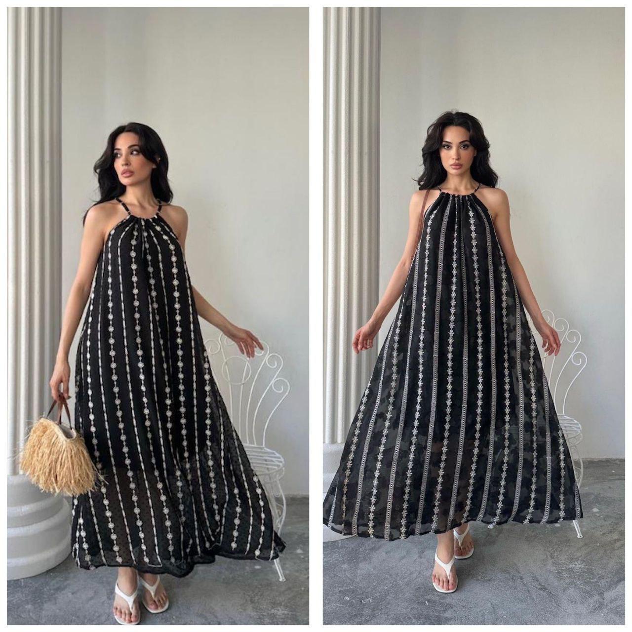 WhatsApp Image 2025-08-29 at 3.03.54 PM Black halter-neck maxi dress - Image 1